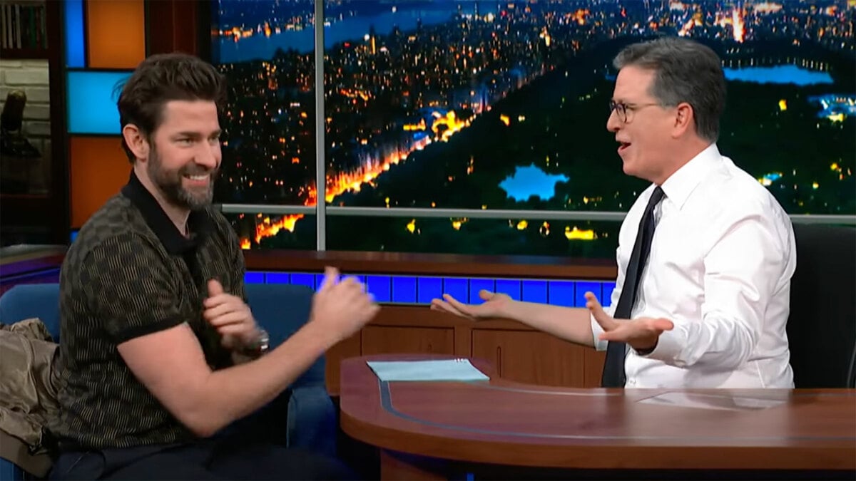 John Krasinski takes on Stephen Colbert in a brutally tense arm wrestle